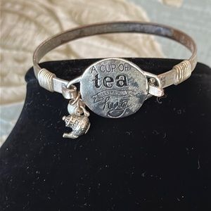 Darling bracelet for tea lovers I think it was handmade by someone who was